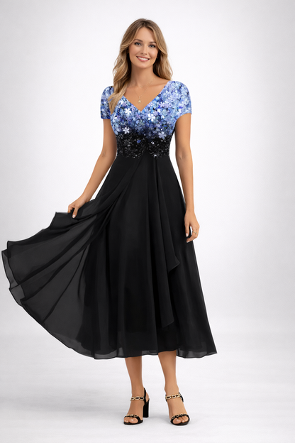 Camille Laurent | Elegant festkjole i midi-længde med blomsterprint og chiffon