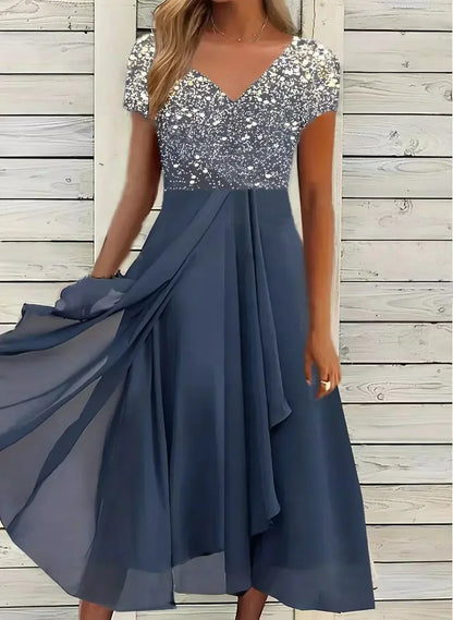 Camille Laurent | Elegant festkjole i midi-længde med blomsterprint og chiffon